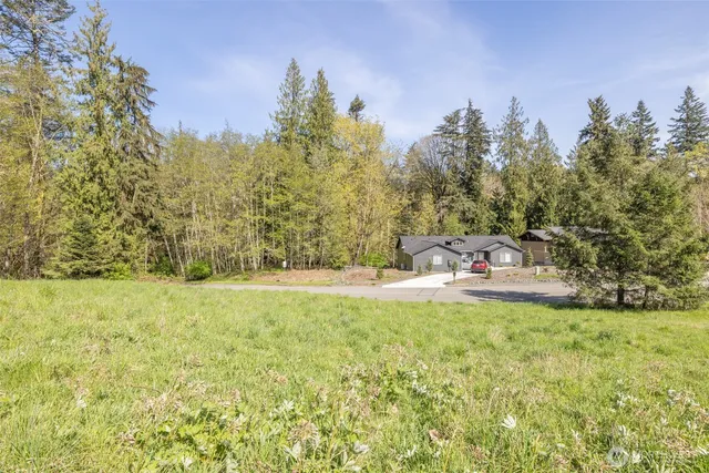 a view of outdoor space and a yard