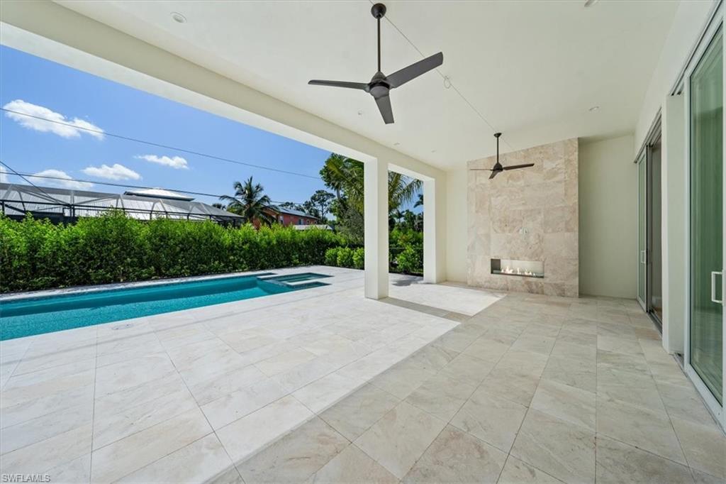 23511 Coconut Road Estero, FL 34134 - Photo 38 of 50 a view of a porch with a backyard