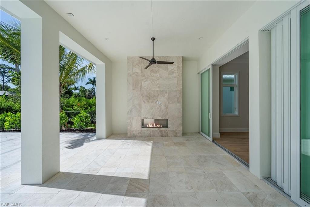 23511 Coconut Road Estero, FL 34134 - Photo 40 of 50 a view of a hallway with windows