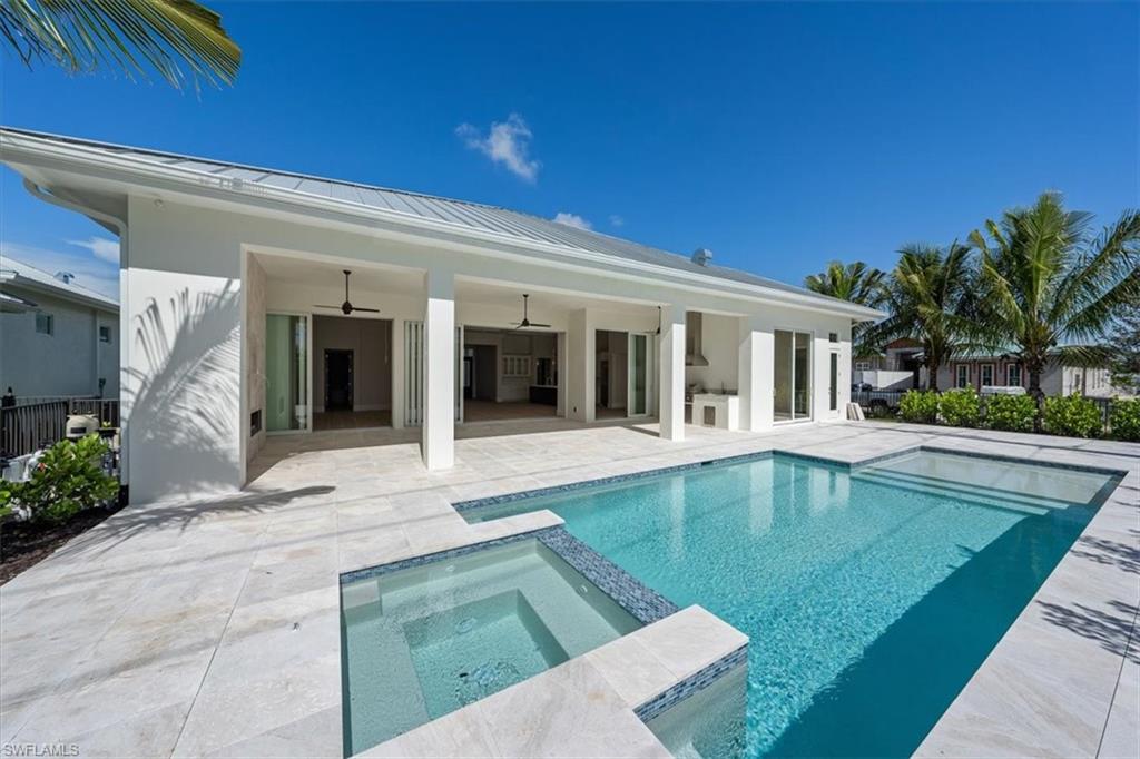 23511 Coconut Road Estero, FL 34134 - Photo 44 of 50 a view of pool with outdoor seating