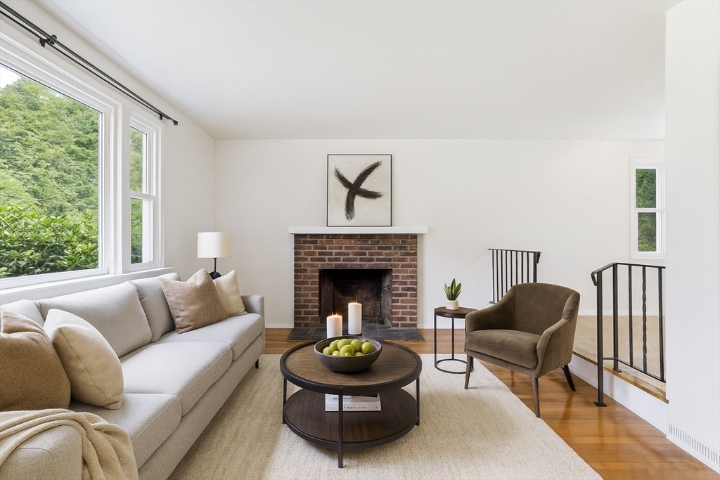 91 Old Post Road Sharon, MA 02067 - Photo 3 of 18 a living room with furniture a window and a fireplace