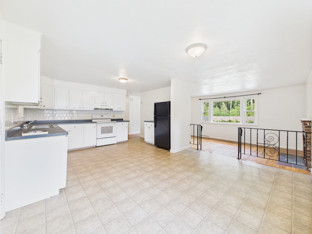 91 Old Post Road Sharon, MA 02067 - Photo 4 of 18 a view of kitchen with furniture and refrigerator