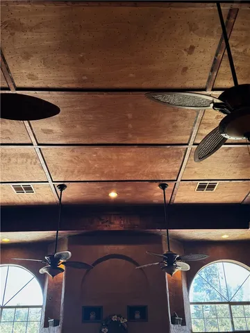 a view of a dining room with furniture and window