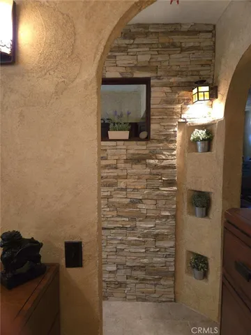 a bathroom with a toilet sink and shower