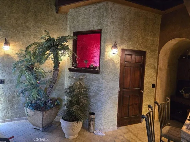 a kitchen with a sink cabinets and appliances