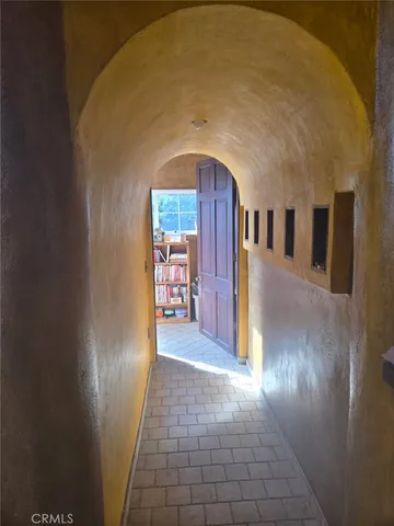 a view of room with a flat screen tv