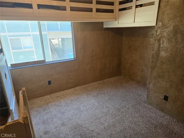 a room with furniture and fireplace