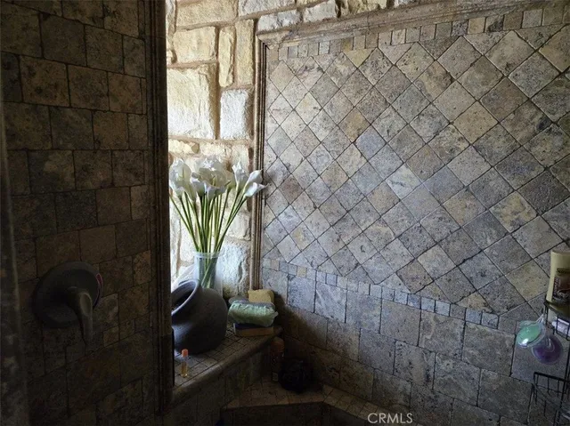 a bathroom with a sink and a shower curtain