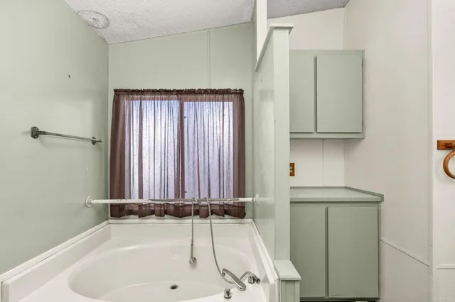 a bathroom with a sink and a bathtub