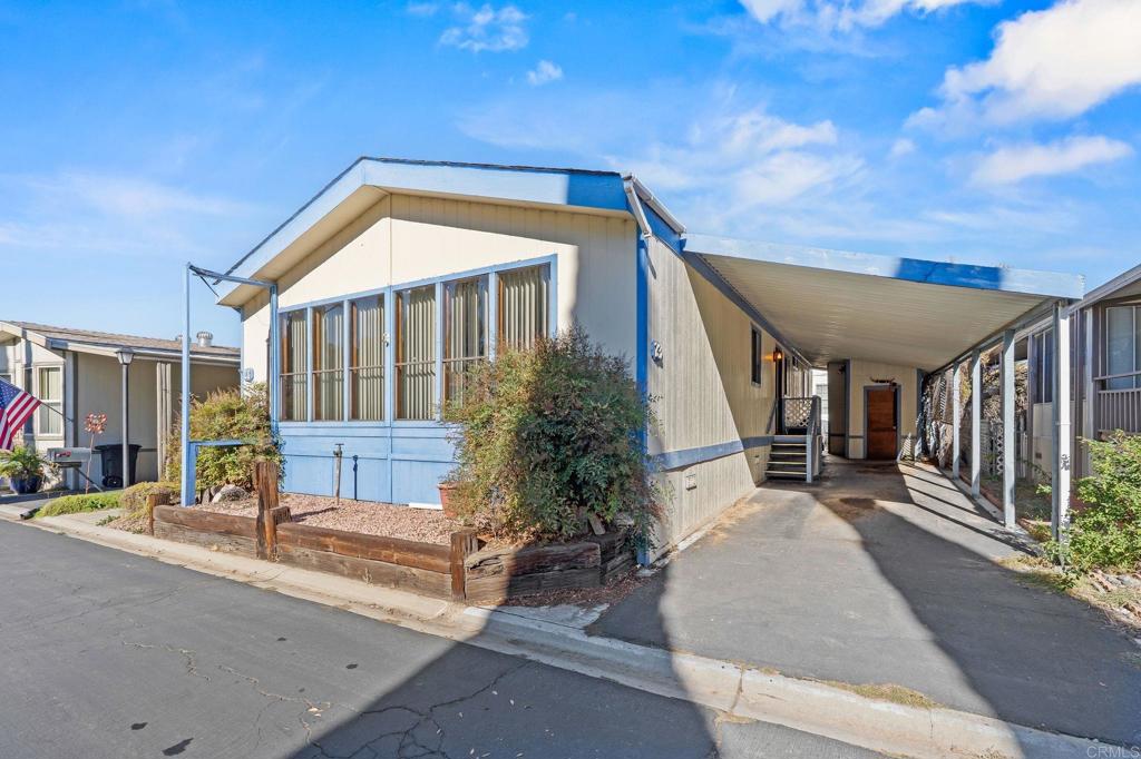 11949 Riverside Drive, Unit 23 Lakeside, CA 92040 - Photo 2 of 35 a view of house with outdoor space and sitting area
