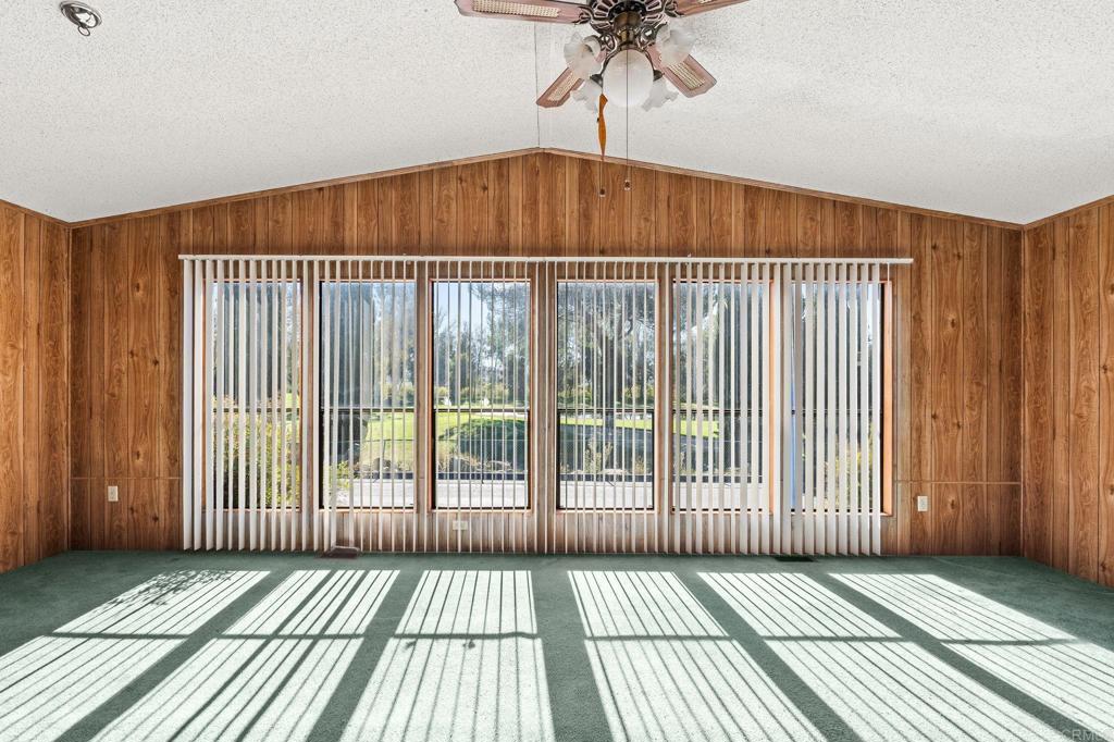 11949 Riverside Drive, Unit 23 Lakeside, CA 92040 - Photo 3 of 35 a view of a room with wooden floor and windows