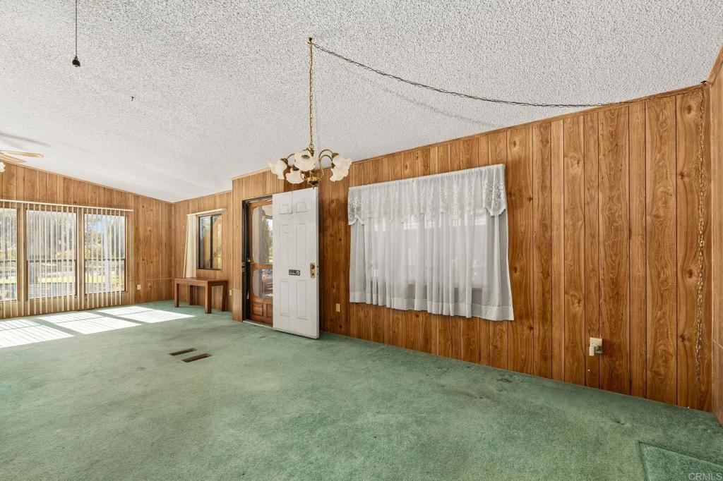 11949 Riverside Drive, Unit 23 Lakeside, CA 92040 - Photo 10 of 35 a view of an empty room with a window