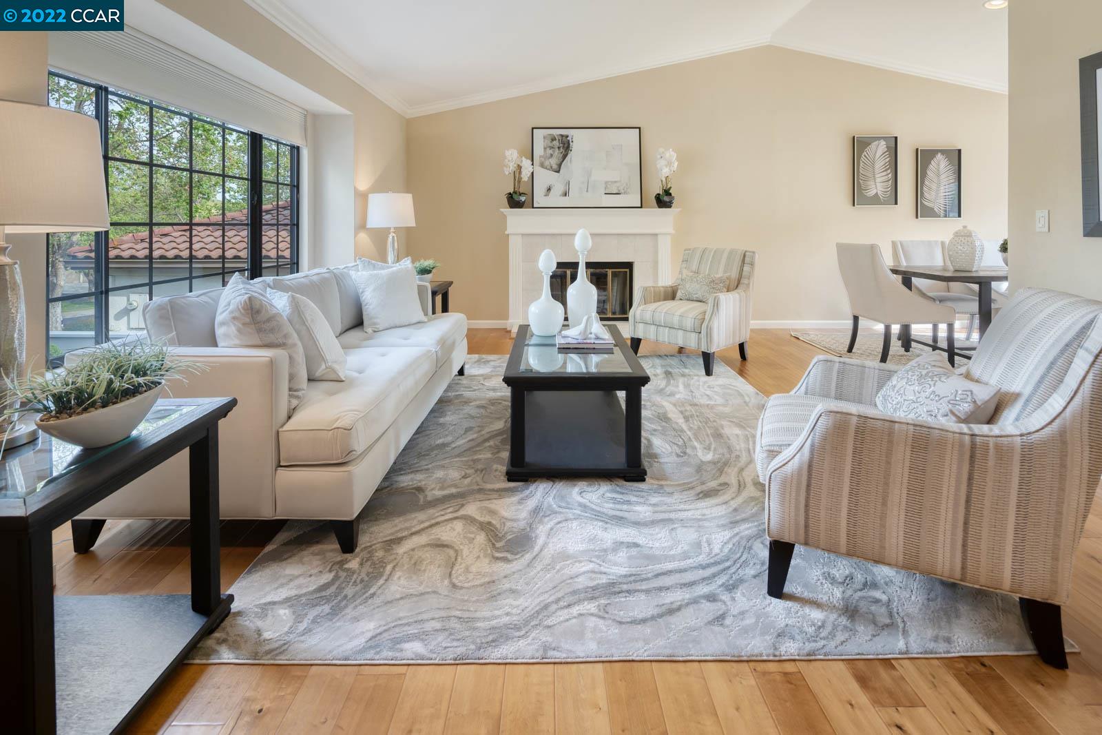 1115 Canyon Hills Road San Ramon, CA 94582 - Photo 1 of 1 a living room with furniture and a large window