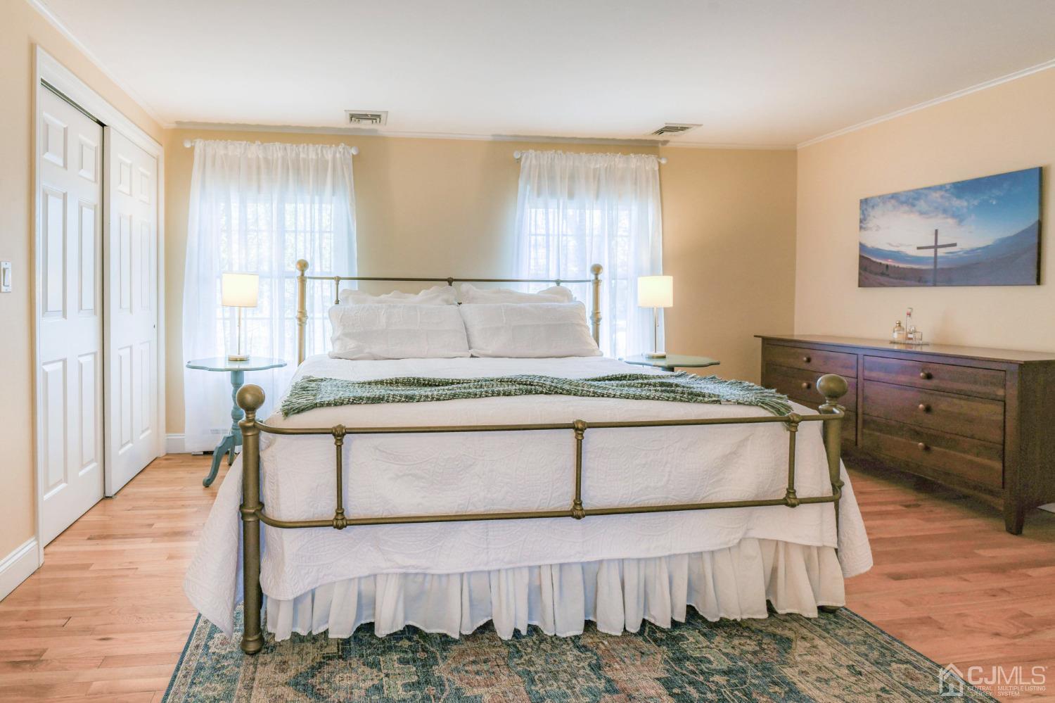 77 1st Street Edison, NJ 08837 - Photo 22 of 50 a living room with a couch and a table