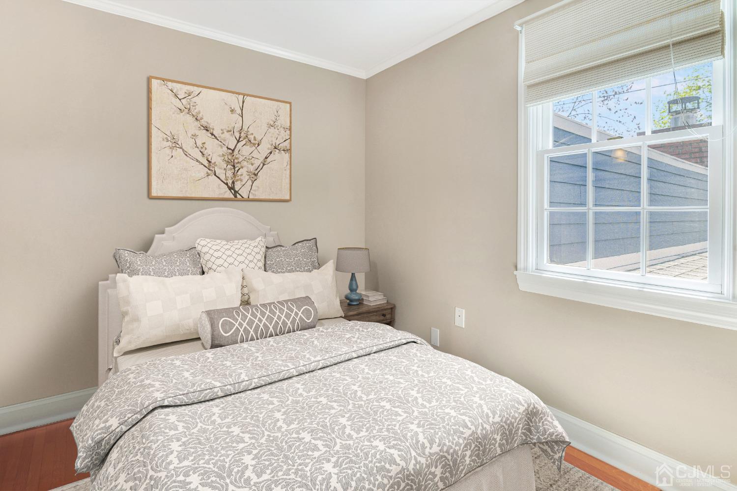 77 1st Street Edison, NJ 08837 - Photo 27 of 50 a bedroom with a bed and a window