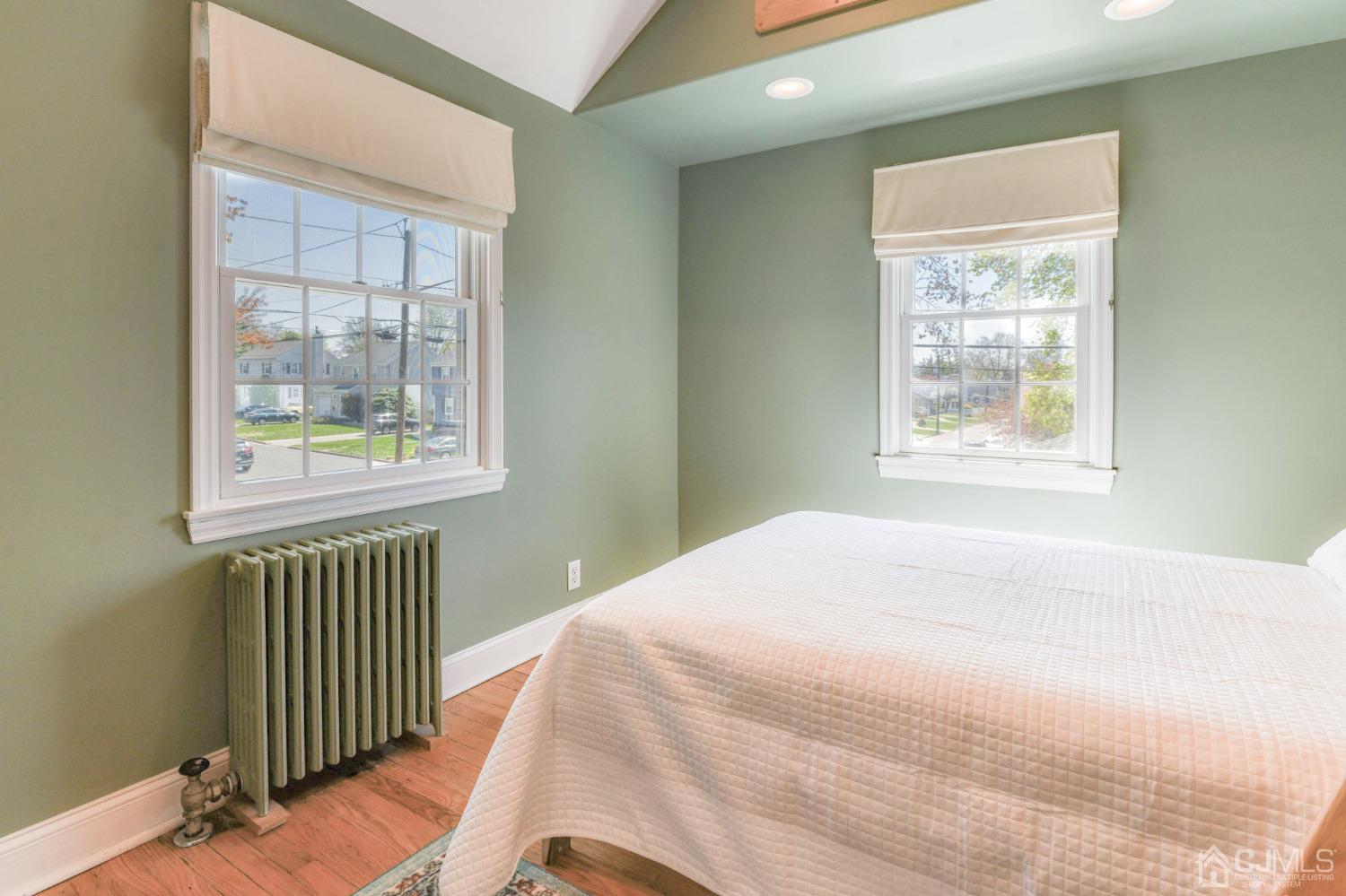 77 1st Street Edison, NJ 08837 - Photo 28 of 50 a bedroom with a bed and a window