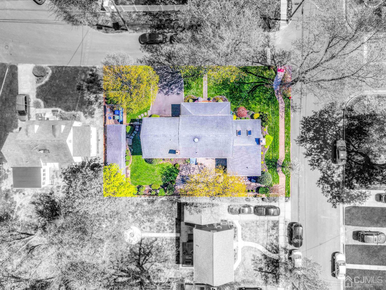 77 1st Street Edison, NJ 08837 - Photo 4 of 50 an aerial view of a house with a swimming pool