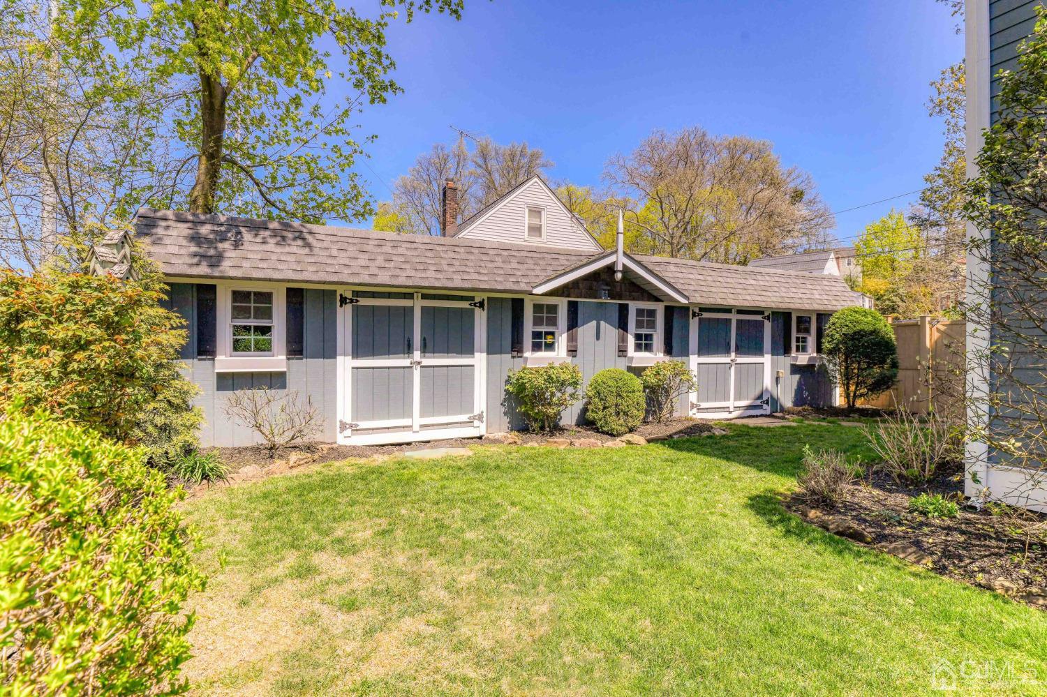 77 1st Street Edison, NJ 08837 - Photo 41 of 50 a front view of a house with a yard