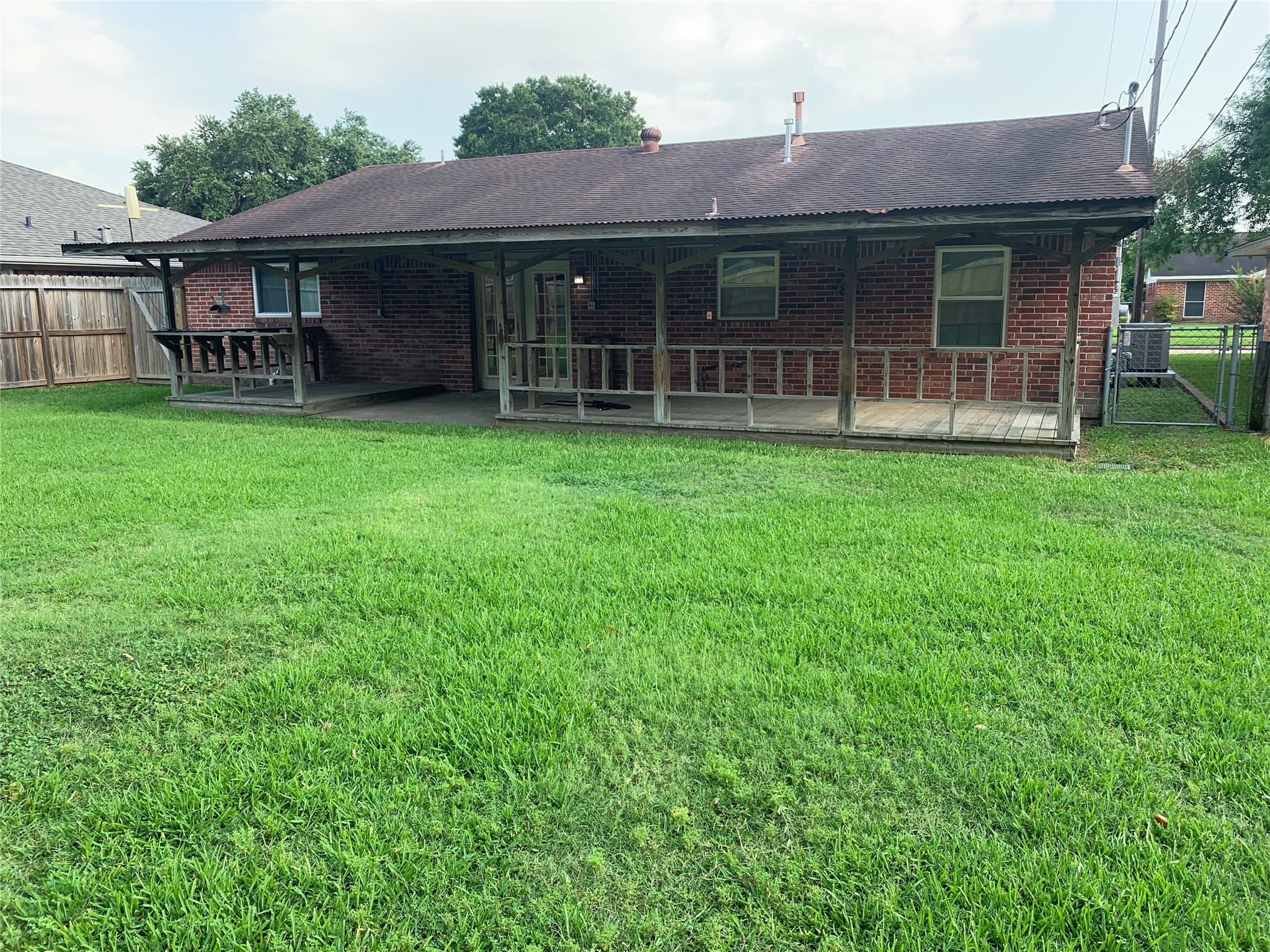1110 East Rutgers Lane Deer Park, TX 77536 - Photo 19 of 19 Rear Elevation of home. Back yard is fully fenced.