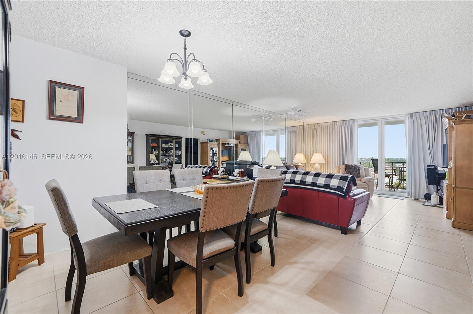 521 North Riverside Drive, Unit 606 Pompano Beach, FL 33062 - Photo 8 of 50 a view of a dining room with furniture