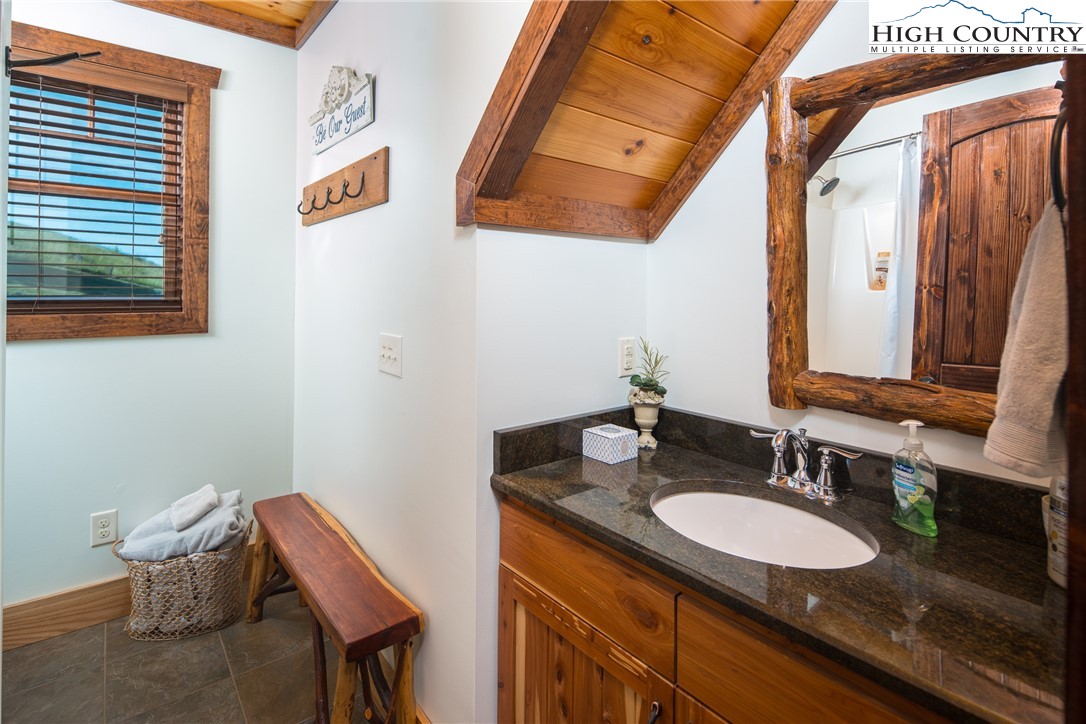421 Chappell Farm Road Banner Elk, NC 28604 - Photo 30 of 49 a bathroom with a sink and a mirror