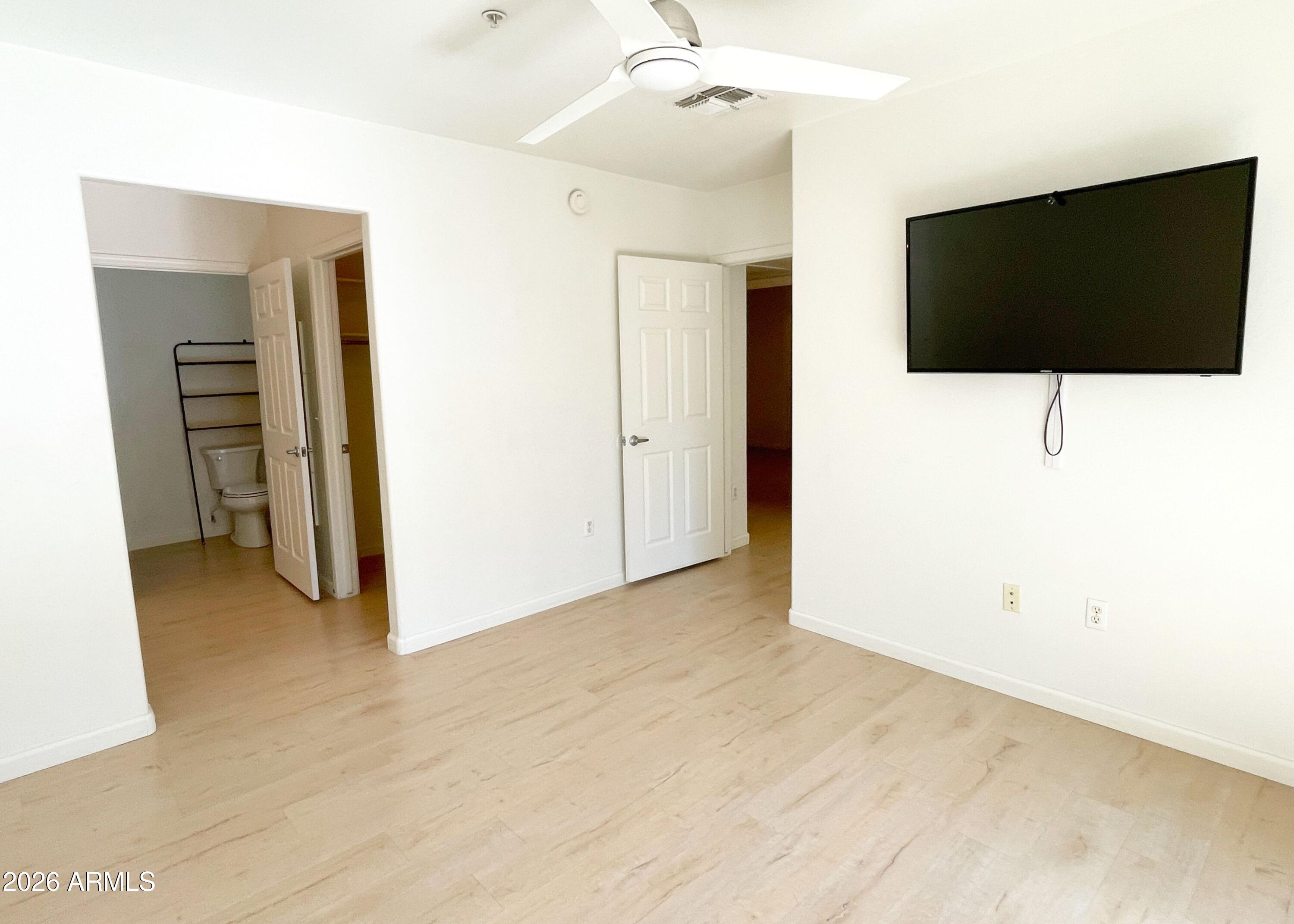 1295 North Ash Street, Unit 828 Gilbert, AZ 85233 - Photo 12 of 24 a view of a livingroom with a flat screen tv