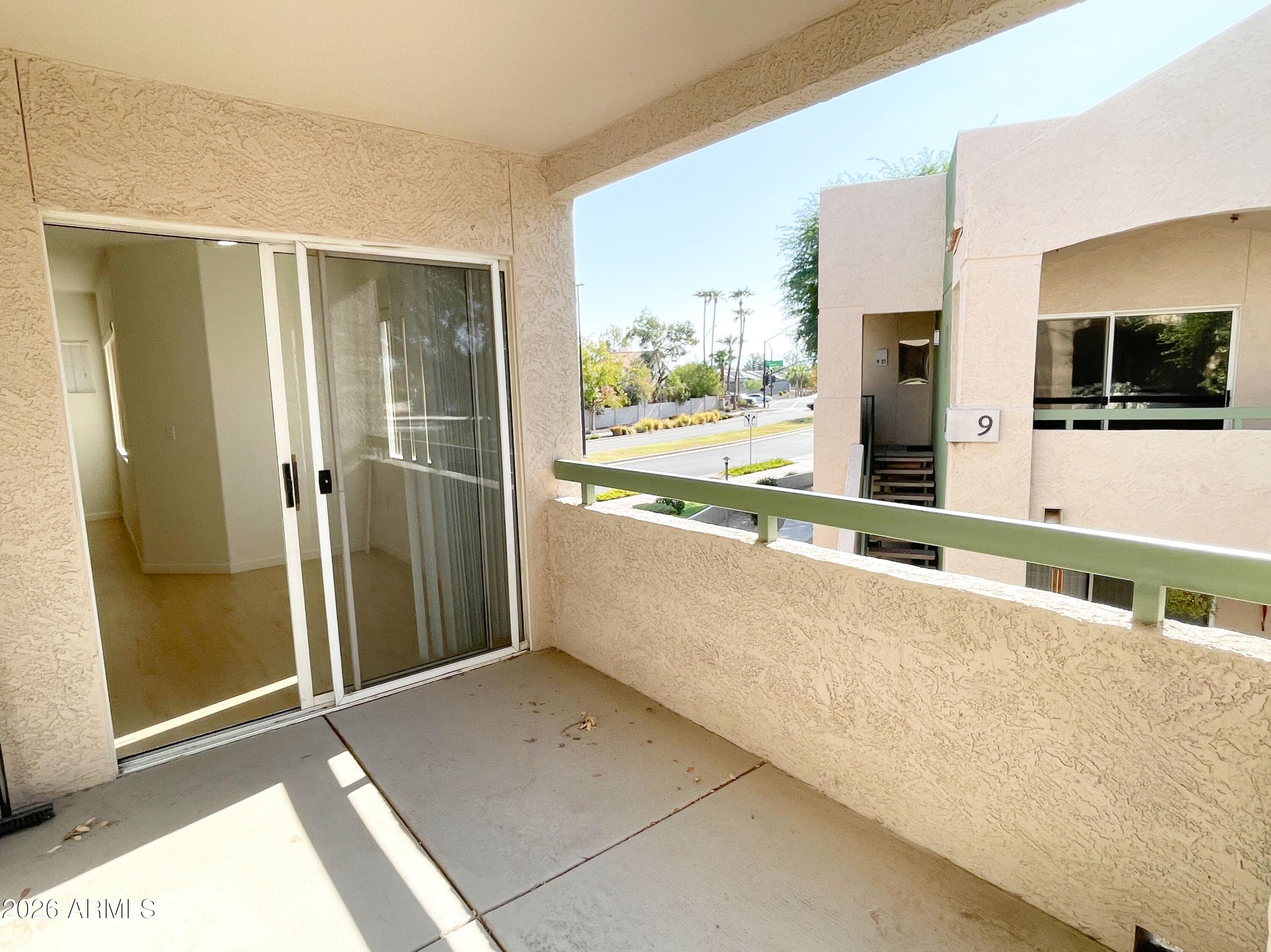 1295 North Ash Street, Unit 828 Gilbert, AZ 85233 - Photo 20 of 24 a view of a kitchen with a sink and a large window
