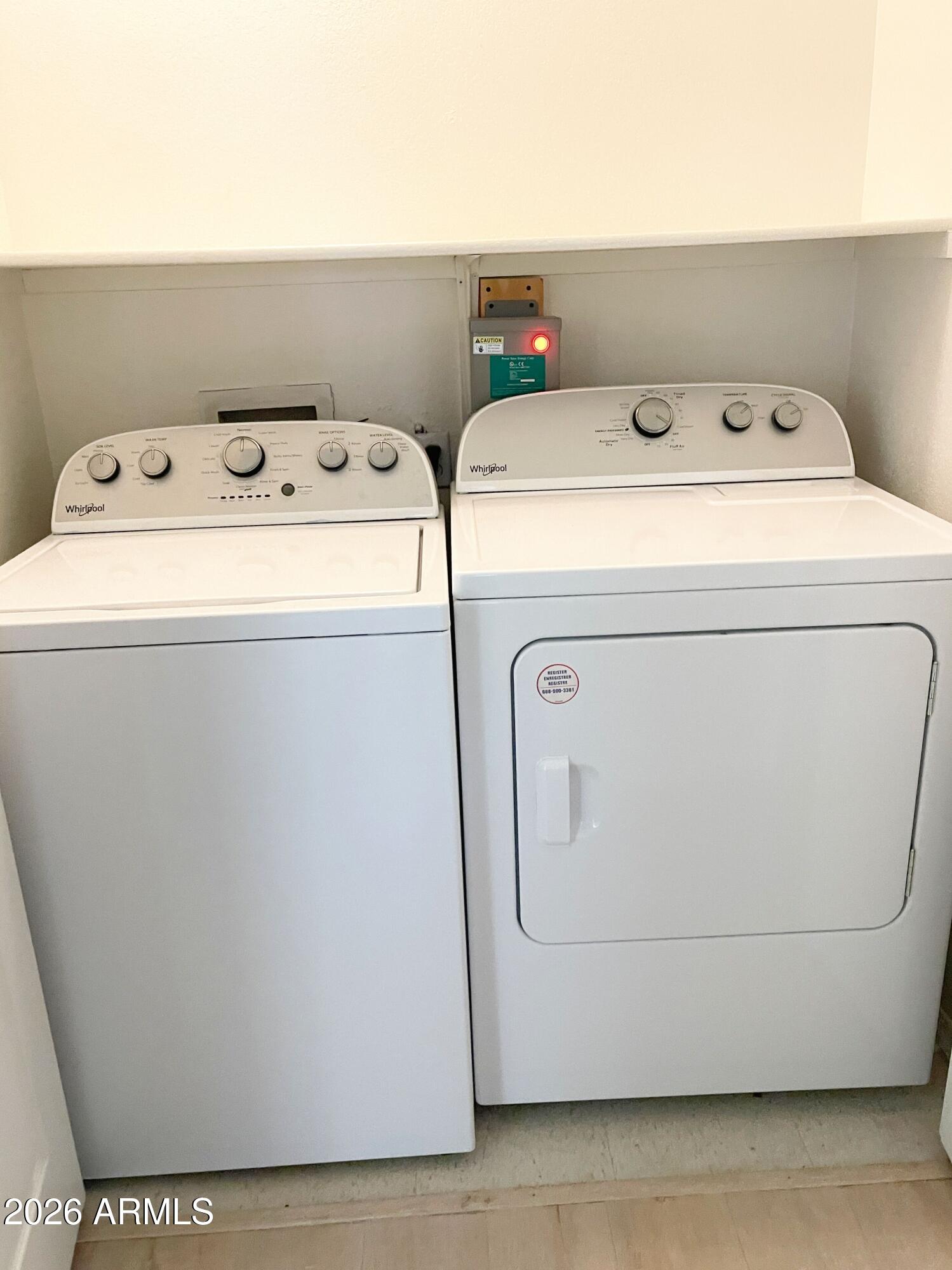 1295 North Ash Street, Unit 828 Gilbert, AZ 85233 - Photo 21 of 24 a utility room with dryer and washer