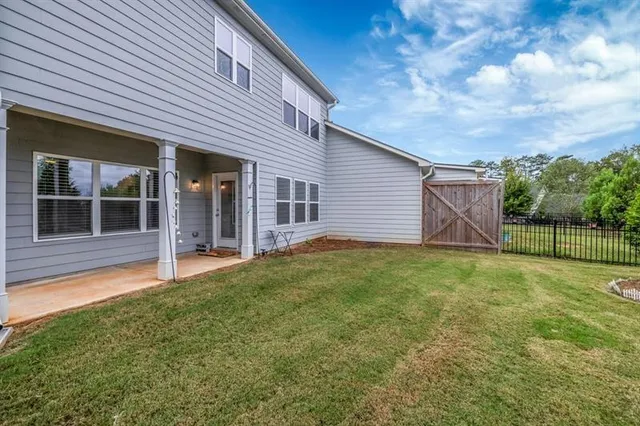a view of a backyard with a garden and stairs