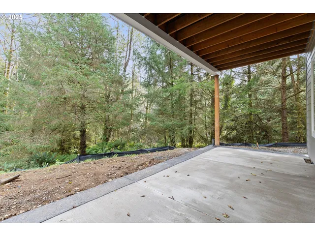 a view of a backyard of a house