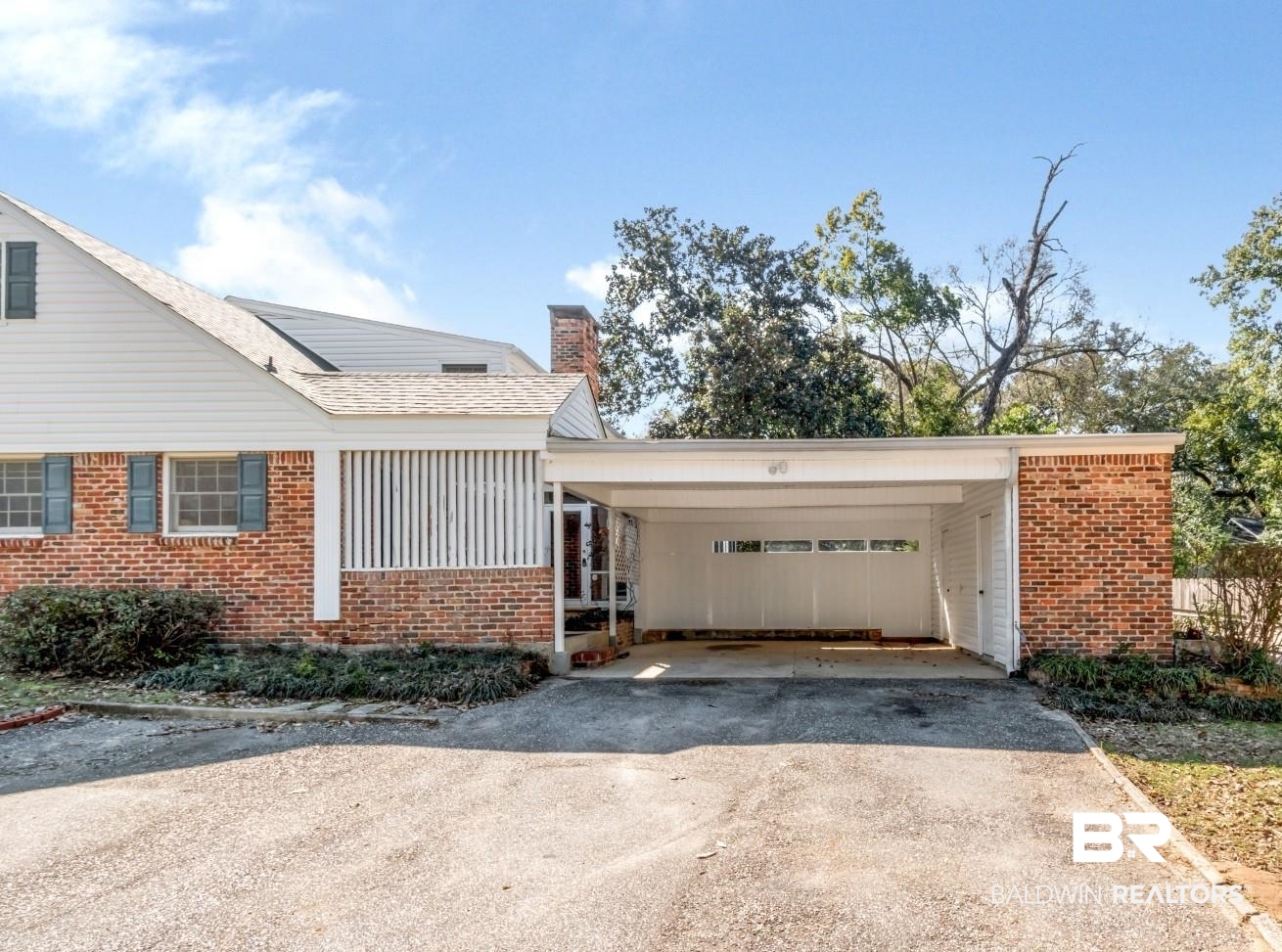 4543 Kingsway Drive Mobile, AL 36608 - Photo 25 of 28 View of front of home featuring aphalt driveway, an attached carport, and brick siding