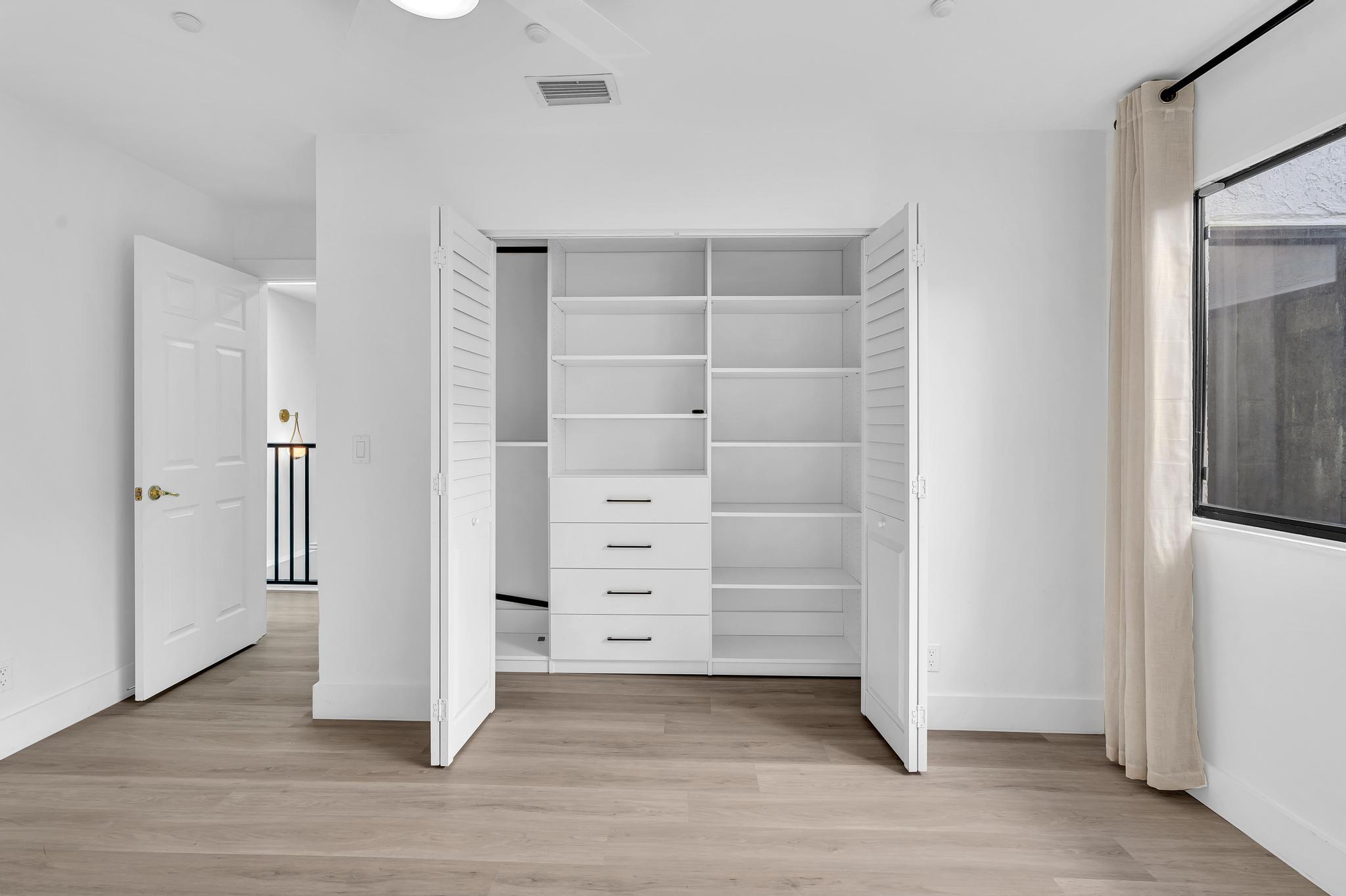 6565 Parkview Drive, Unit C Boca Raton, FL 33433 - Photo 11 of 40 an empty room with closet