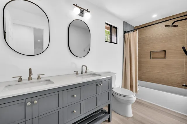 a bathroom with a sink and mirror