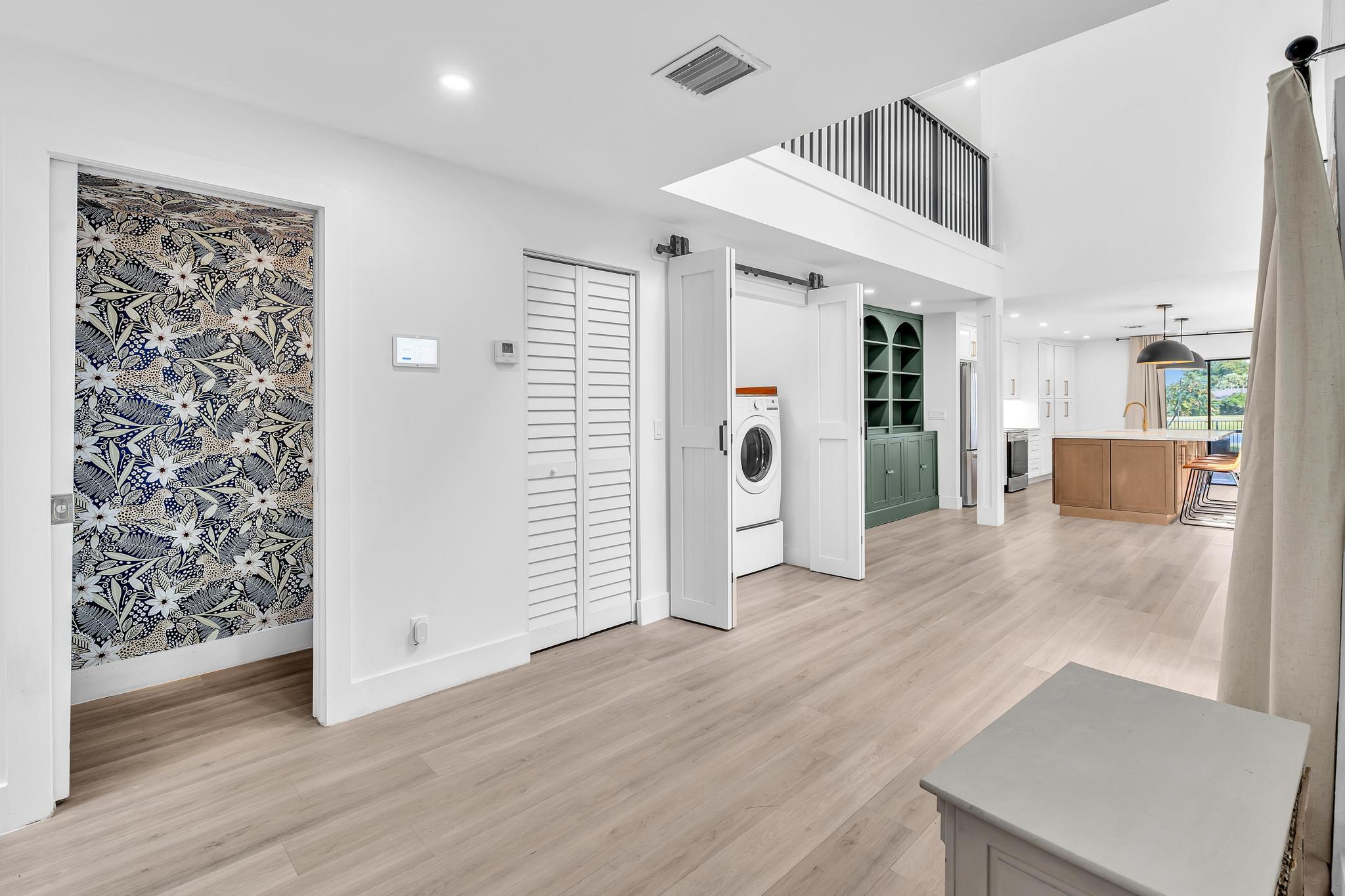 6565 Parkview Drive, Unit C Boca Raton, FL 33433 - Photo 3 of 40 an entryway at livingroom with furniture and wooden floor