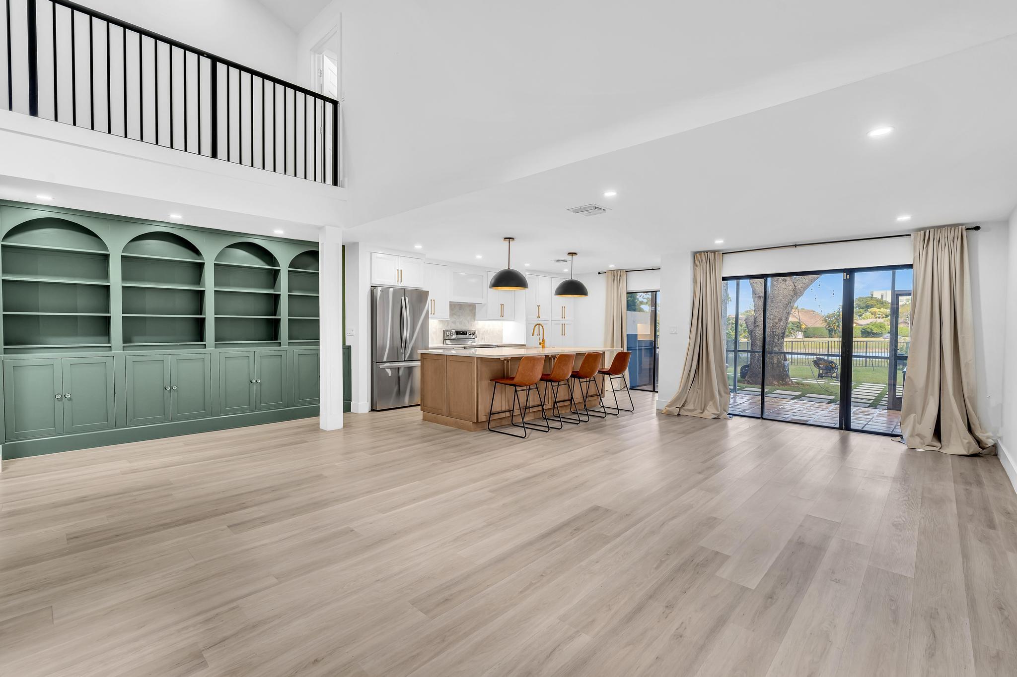 6565 Parkview Drive, Unit C Boca Raton, FL 33433 - Photo 4 of 40 a view of a livingroom with furniture wooden floor and windows