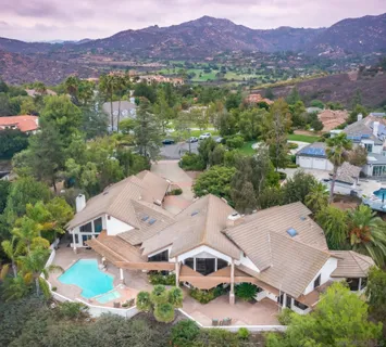 an aerial view of house with an outdoor space