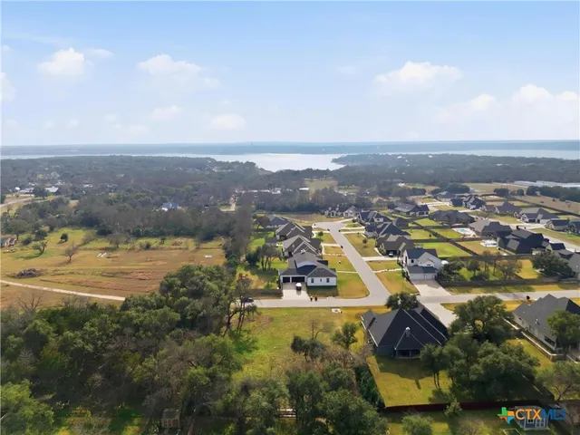 an aerial view of residential house with outdoor space