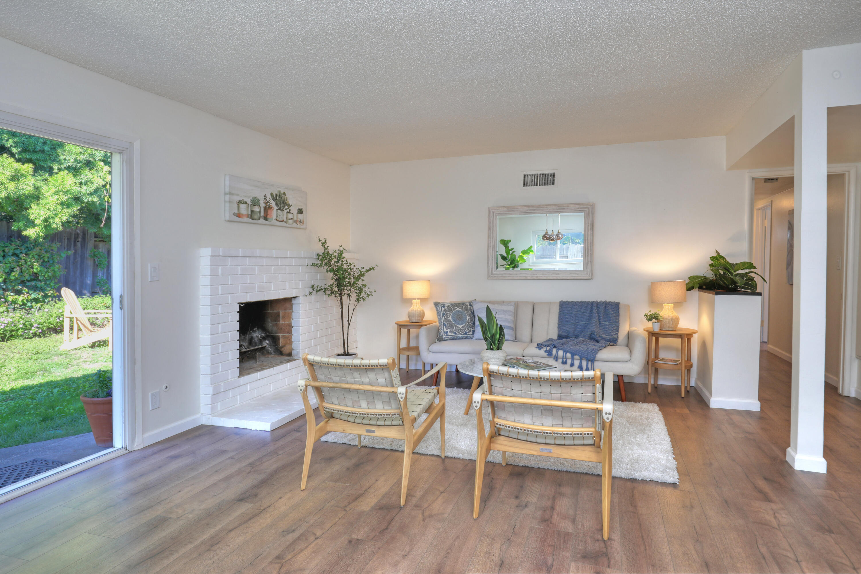 3704 Capri Drive Santa Barbara, CA 93105 - Photo 11 of 33 a living room with furniture and a fireplace