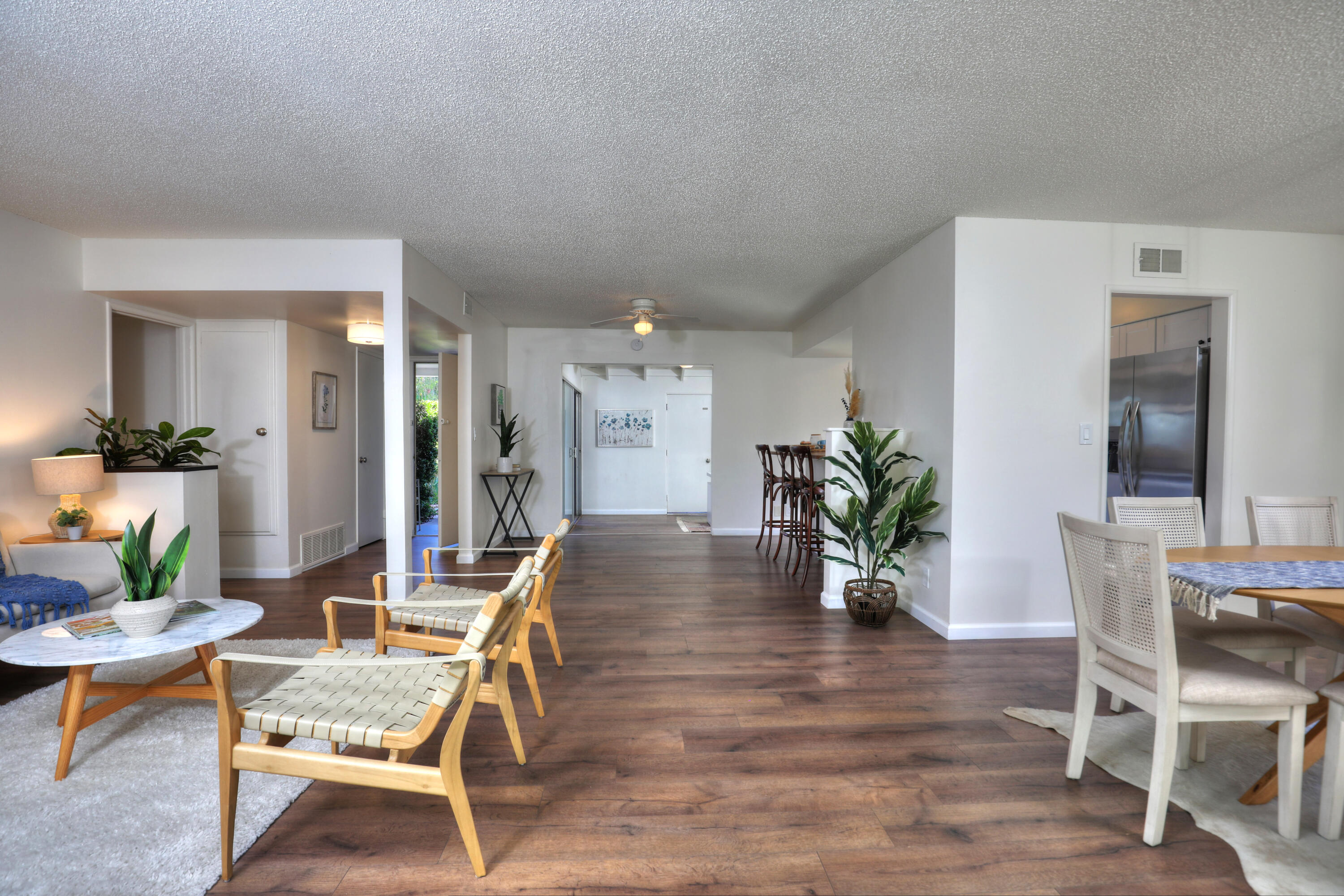 3704 Capri Drive Santa Barbara, CA 93105 - Photo 13 of 33 a view of a dining room with furniture and wooden floor