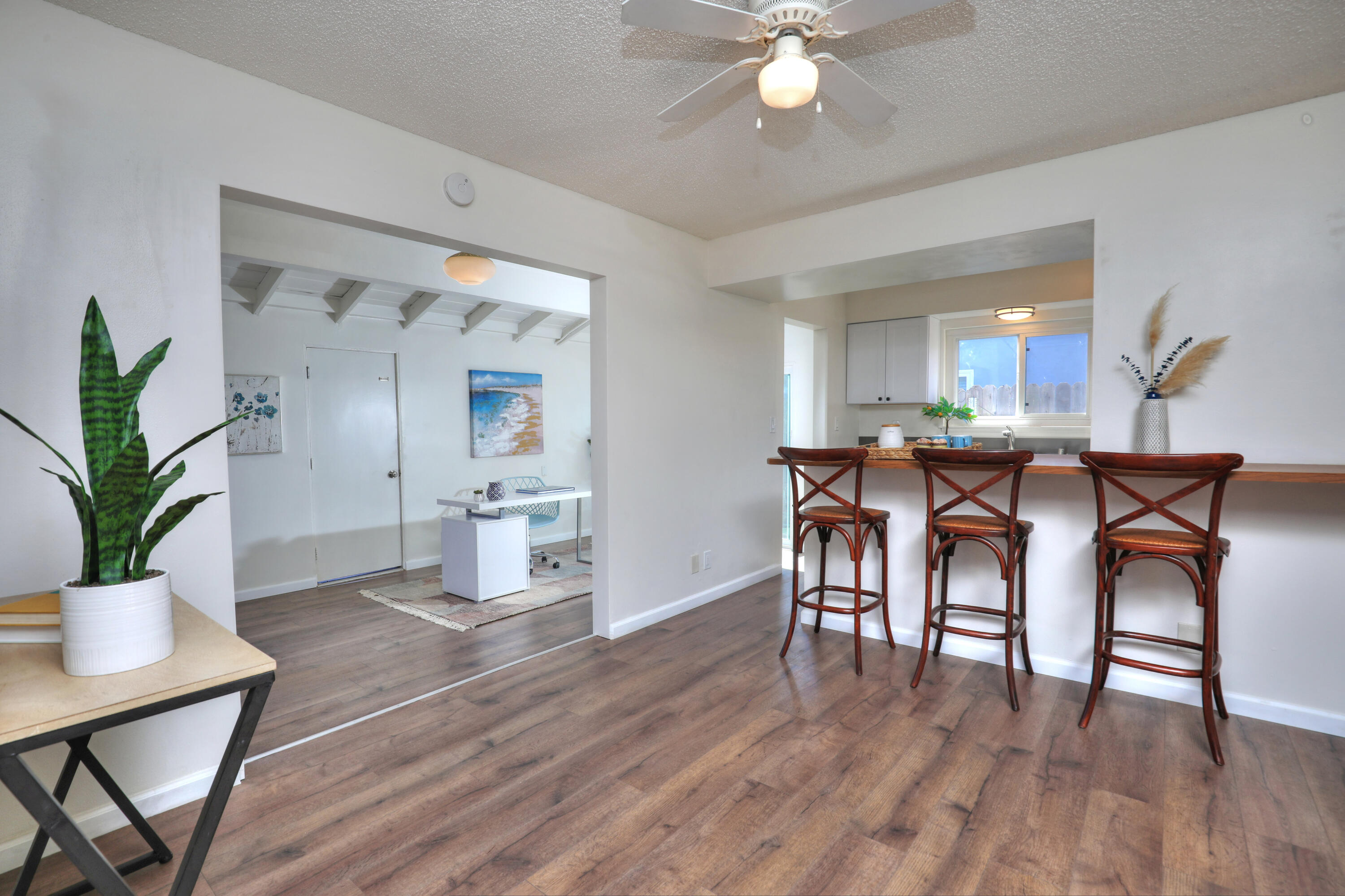 3704 Capri Drive Santa Barbara, CA 93105 - Photo 14 of 33 a view of a dining room with furniture and wooden floor