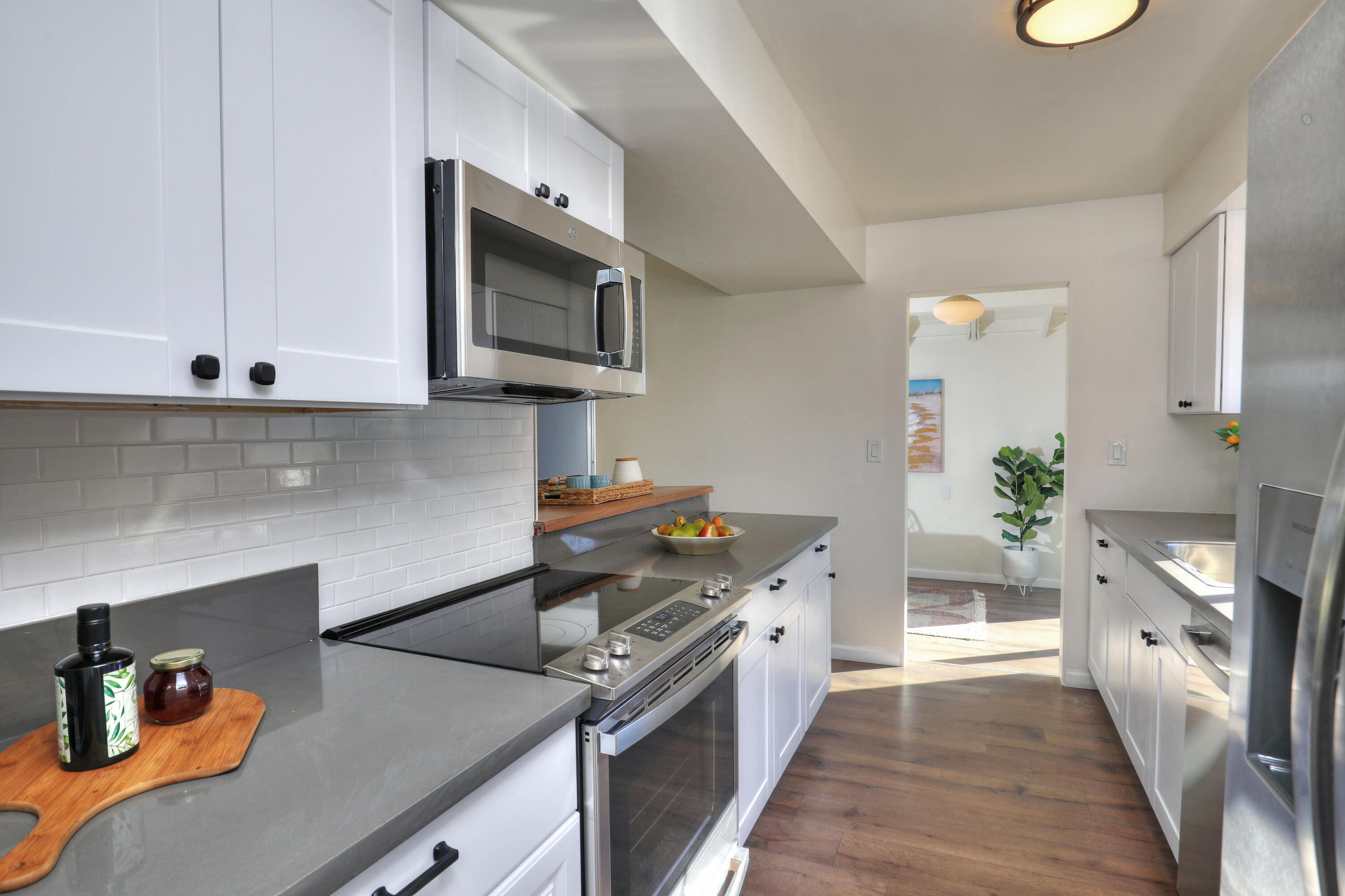 3704 Capri Drive Santa Barbara, CA 93105 - Photo 20 of 33 a kitchen with stainless steel appliances granite countertop a sink and a stove