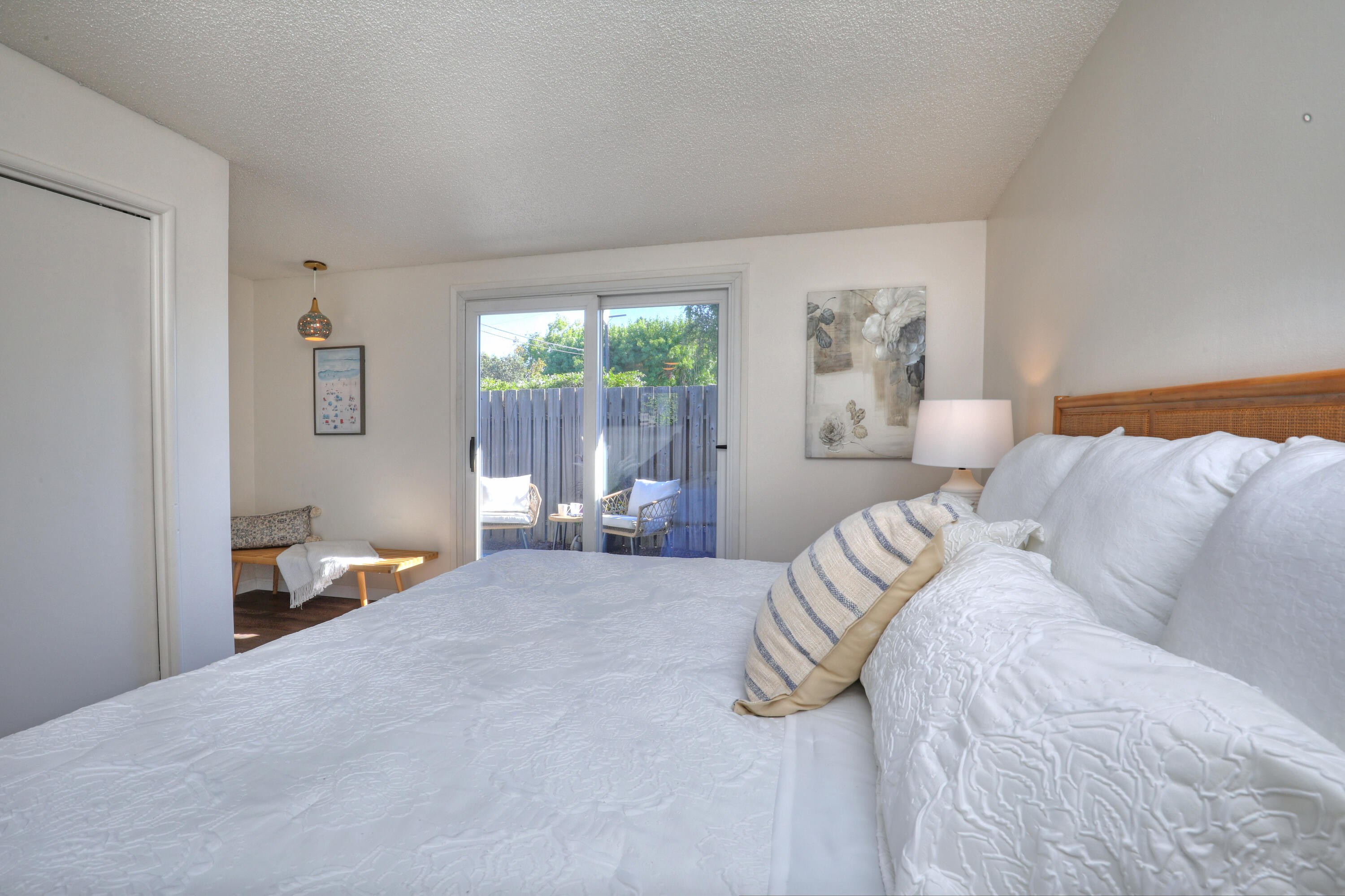 3704 Capri Drive Santa Barbara, CA 93105 - Photo 22 of 33 a bedroom with a bed couch and a window