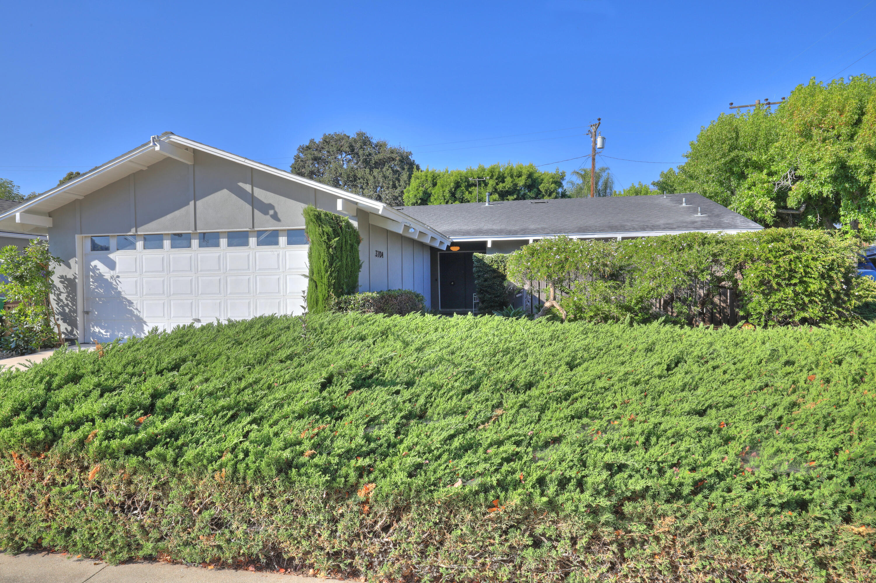 3704 Capri Drive Santa Barbara, CA 93105 - Photo 3 of 33 a front view of a house with a yard