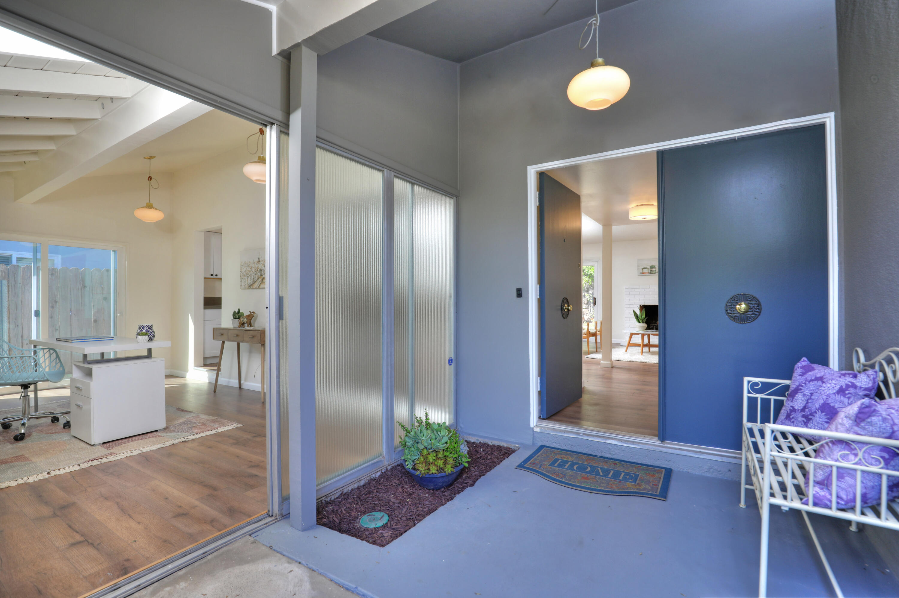 3704 Capri Drive Santa Barbara, CA 93105 - Photo 5 of 33 a view of a hallway with kitchen and dining area