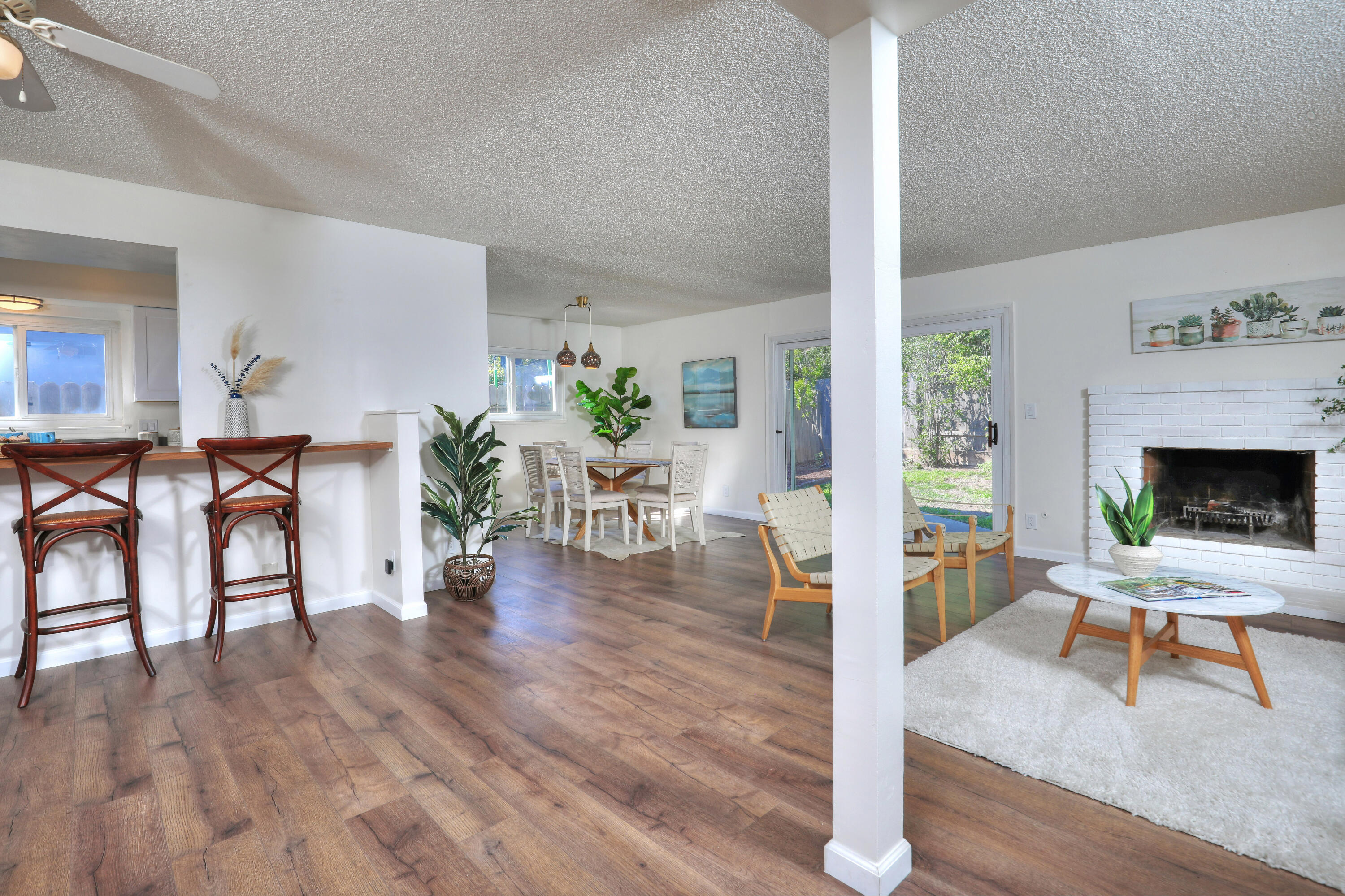 3704 Capri Drive Santa Barbara, CA 93105 - Photo 7 of 33 a living room with furniture and a fireplace