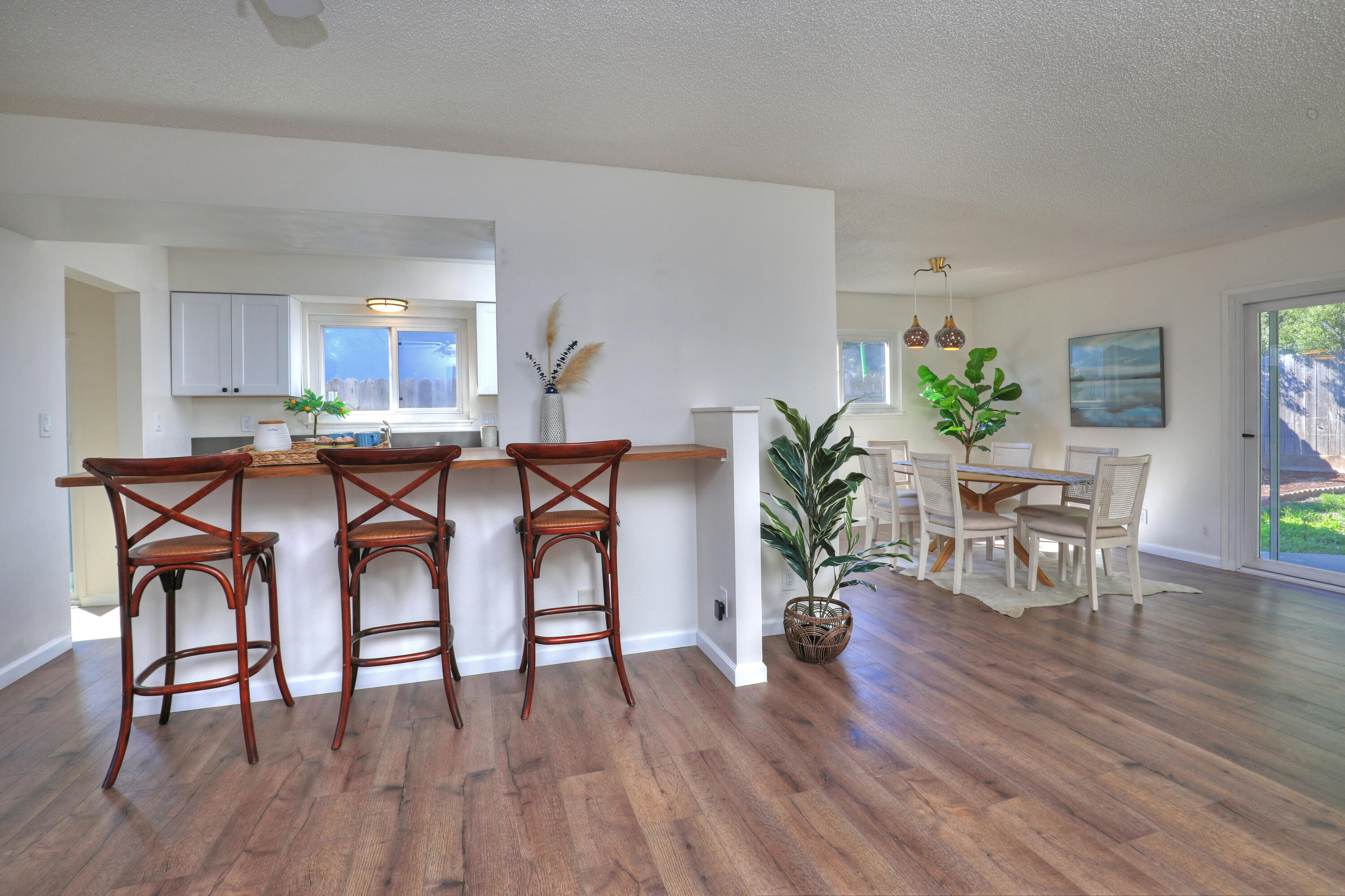 3704 Capri Drive Santa Barbara, CA 93105 - Photo 8 of 33 a dining room with furniture and wooden floor