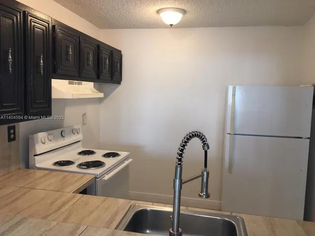 a bathroom with a toilet and a bathtub