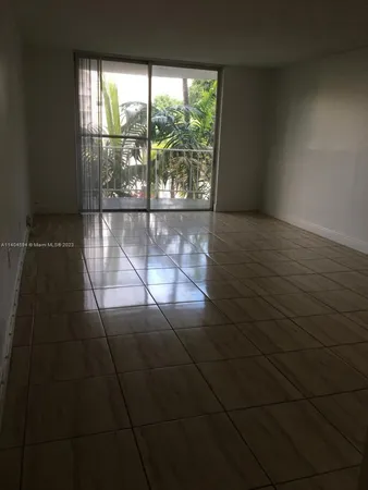 a view of a room with a large window