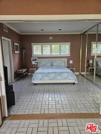 a view of a living room and bathroom