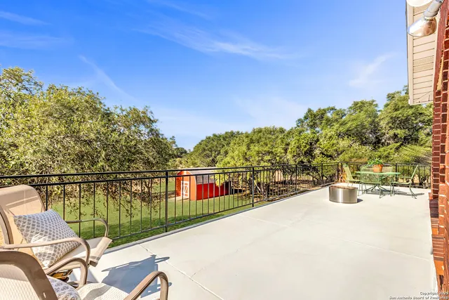 a view of a balcony with lake view